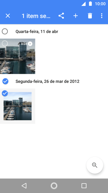 Pressione as fotos ou os vídeos desejados. Pressione as fotos ou os vídeos desejados.
