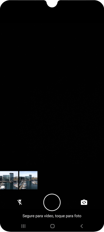 Pressione a foto ou o vídeo desejado. Pressione a foto ou o vídeo desejado.