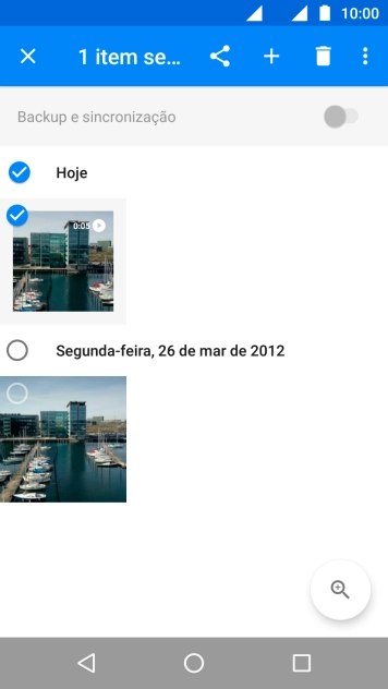 Pressione as fotos e vídeos desejados para selecioná-los. Pressione as fotos e vídeos desejados para selecioná-los.
