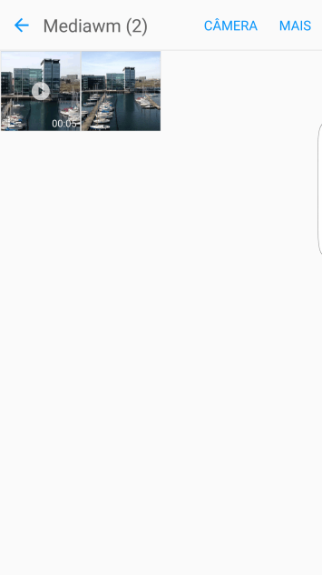 Pressione a foto ou o vídeo desejado, e continue pressionando por um instante. Pressione a foto ou o vídeo desejado, e continue pressionando por um instante.