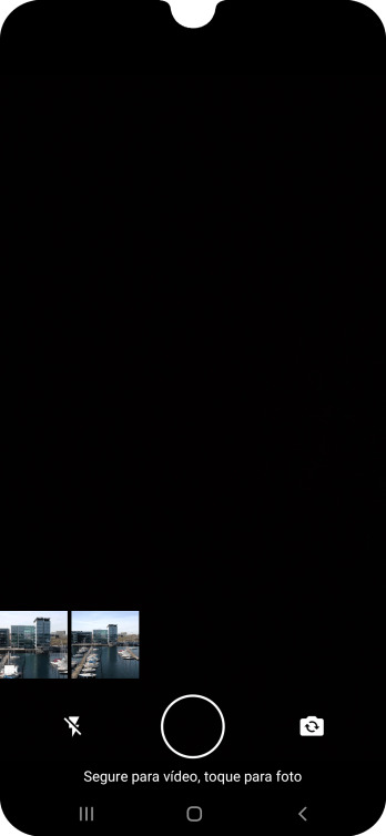 Pressione a foto ou o vídeo desejado. Pressione a foto ou o vídeo desejado.