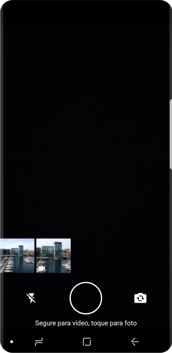 Pressione a foto ou o vídeo desejado. Pressione a foto ou o vídeo desejado.