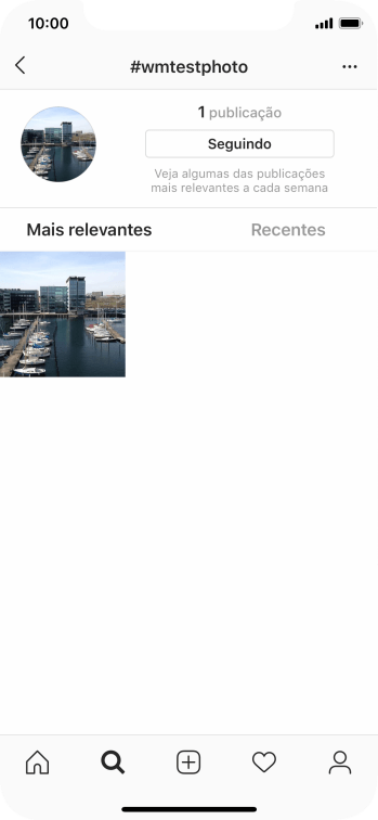 Pressione o ícone de fazer upload, e navegue até a foto ou vídeo desejado. Pressione o ícone de fazer upload, e navegue até a foto ou vídeo desejado.