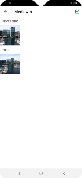 Pressione a foto ou o vídeo desejado. Pressione a foto ou o vídeo desejado.