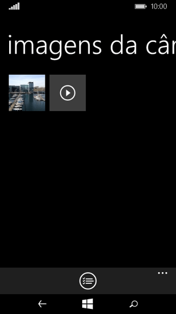 Pressione a foto ou o vídeo, e mantenha a pressão até que um menu pop up seja mostrado no visor Pressione a foto ou o vídeo, e mantenha a pressão até que um menu pop up seja mostrado no visor