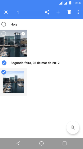 Pressione as fotos e vídeos desejados para selecioná-los. Pressione as fotos e vídeos desejados para selecioná-los.