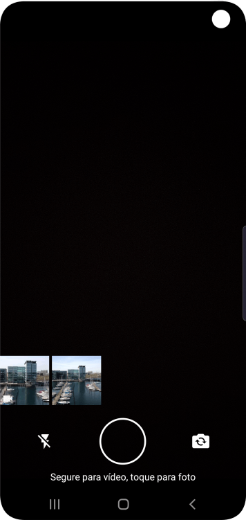 Pressione a foto ou o vídeo desejado. Pressione a foto ou o vídeo desejado.