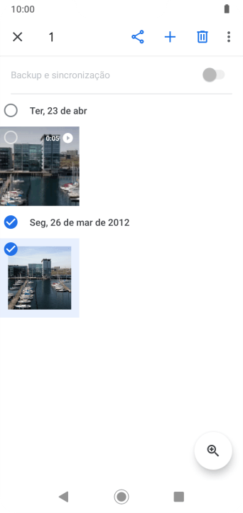 Pressione as fotos ou os vídeos desejados. Pressione as fotos ou os vídeos desejados.