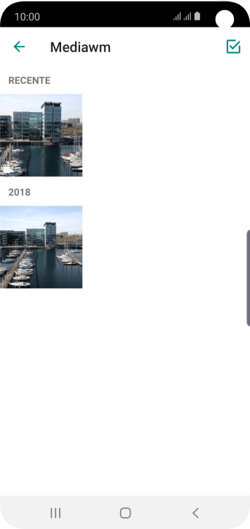 Pressione a foto ou o vídeo desejado. Pressione a foto ou o vídeo desejado.