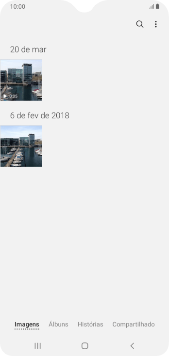 Pressione Álbuns, e navegue até a pasta desejada. Pressione Álbuns, e navegue até a pasta desejada.