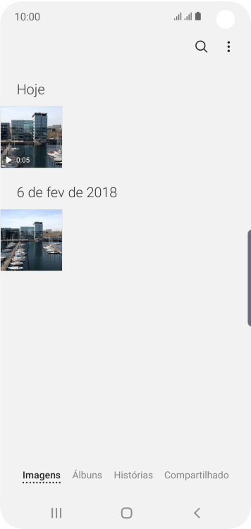 Pressione Álbuns, e navegue até a pasta desejada. Pressione Álbuns, e navegue até a pasta desejada.