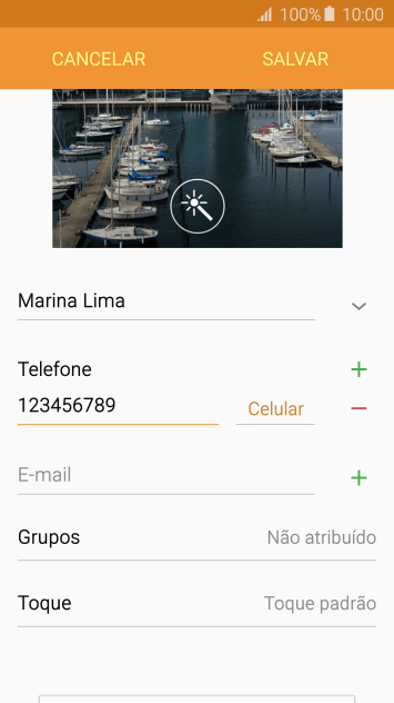 Pressione a lista suspensa ao lado do número de telefone. Pressione a lista suspensa ao lado do número de telefone.