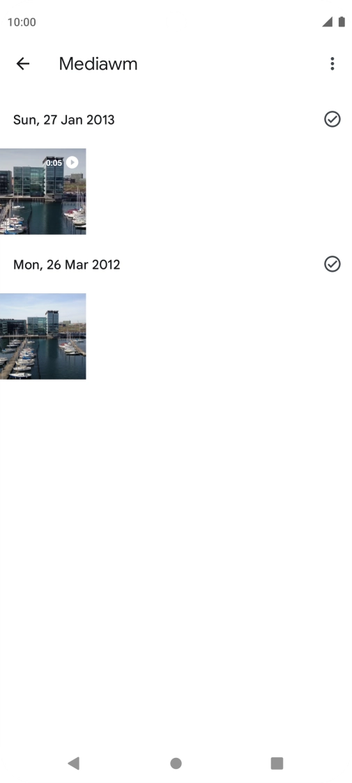 Press and hold any picture or video clip. Press and hold any picture or video clip.