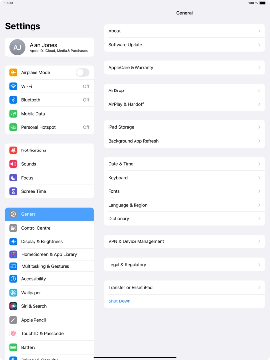 Press your Apple ID. Press your Apple ID.