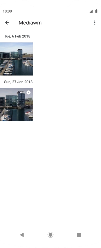 Press and hold any picture or video clip. Press and hold any picture or video clip.