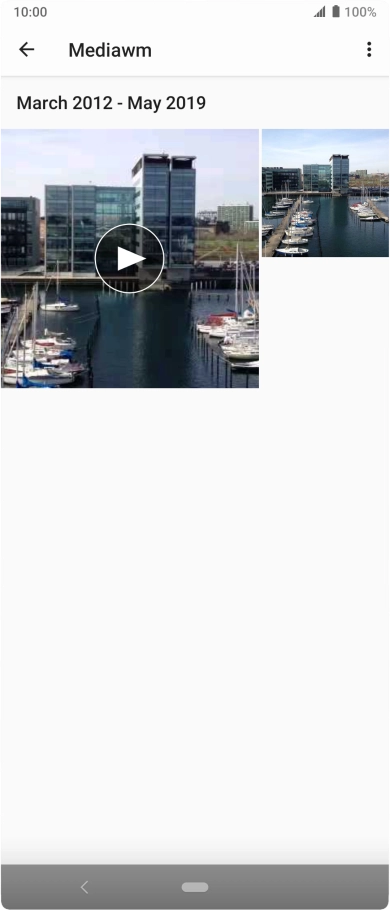 Press and hold the required picture or video clip. Press and hold the required picture or video clip.