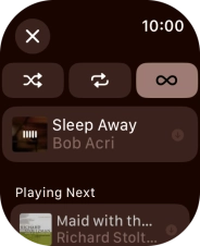 Press the shuffle icon. Press the shuffle icon.