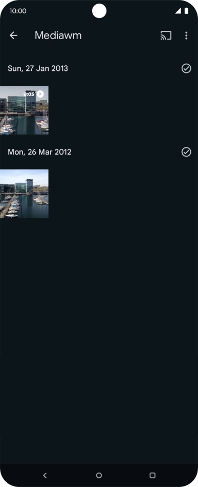 Press and hold any picture or video clip. Press and hold any picture or video clip.