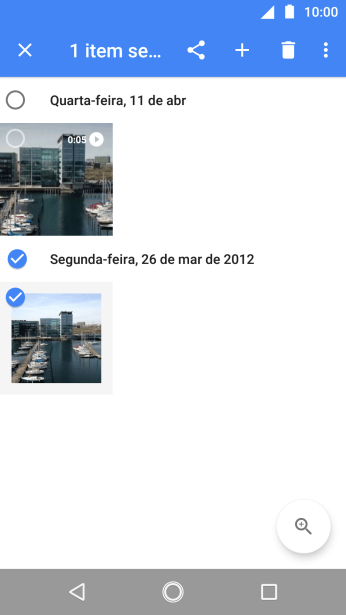 Pressione as fotos ou os vídeos desejados. Pressione as fotos ou os vídeos desejados.