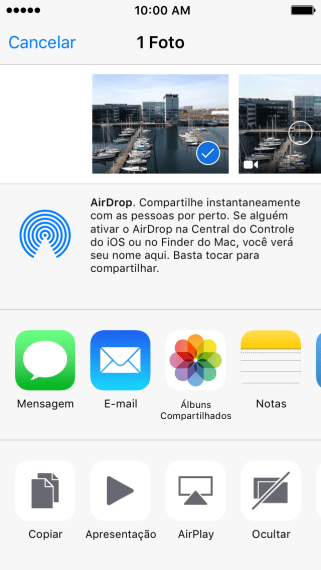 Pressione o ícone de Airdrop para ativar a função. Pressione o ícone de Airdrop para ativar a função.