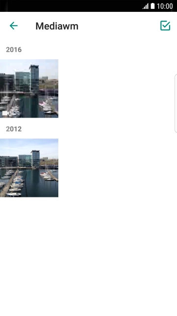 Pressione a foto ou o vídeo desejado. Pressione a foto ou o vídeo desejado.