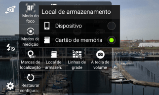 Pressione Dispositivo para salvar as fotos na memória do celular. Pressione Dispositivo para salvar as fotos na memória do celular.