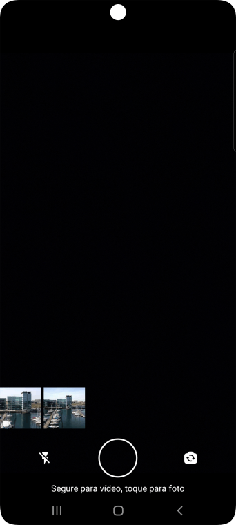 Pressione a foto ou o vídeo desejado. Pressione a foto ou o vídeo desejado.