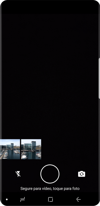 Pressione a foto ou o vídeo desejado. Pressione a foto ou o vídeo desejado.