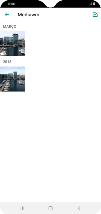 Pressione a foto ou o vídeo desejado. Pressione a foto ou o vídeo desejado.