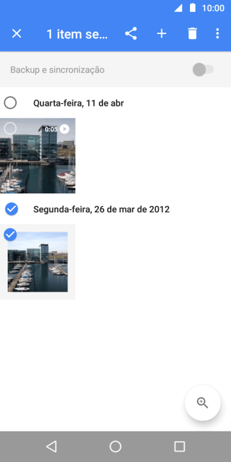 Pressione o campo acima das fotos ou dos vídeos desejados. Pressione o campo acima das fotos ou dos vídeos desejados.