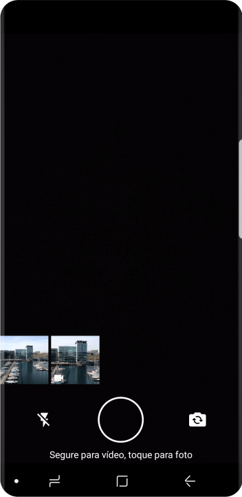 Pressione a foto ou o vídeo desejado. Pressione a foto ou o vídeo desejado.