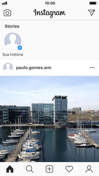 Pressione o ícone de busca. Pressione o ícone de busca.