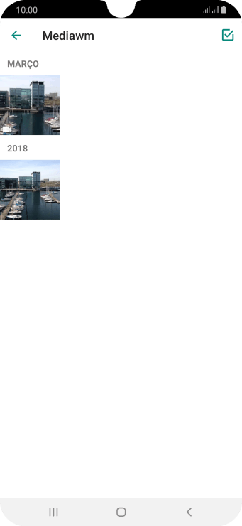 Pressione a foto ou o vídeo desejado. Pressione a foto ou o vídeo desejado.