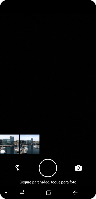 Pressione a foto ou o vídeo desejado. Pressione a foto ou o vídeo desejado.
