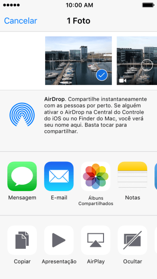 Pressione o ícone de AirDrop para ativar a função. Pressione o ícone de AirDrop para ativar a função.