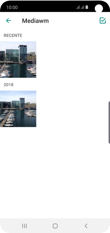 Pressione a foto ou o vídeo desejado. Pressione a foto ou o vídeo desejado.