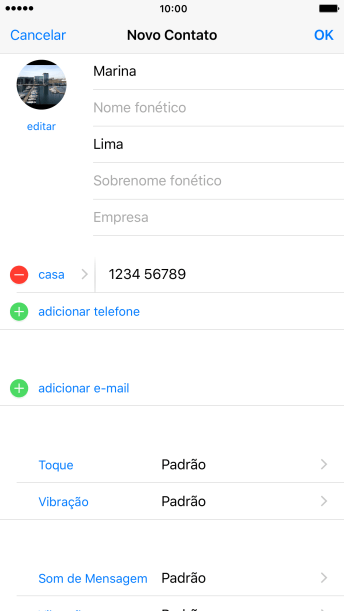 Pressione o campo ao lado do número de telefone. Pressione o campo ao lado do número de telefone.