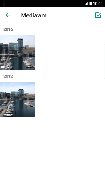Pressione a foto ou o vídeo desejado. Pressione a foto ou o vídeo desejado.
