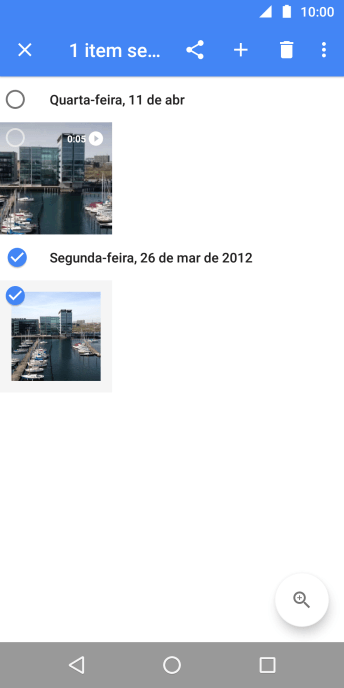 Pressione o campo acima das fotos ou dos vídeos desejados. Pressione o campo acima das fotos ou dos vídeos desejados.