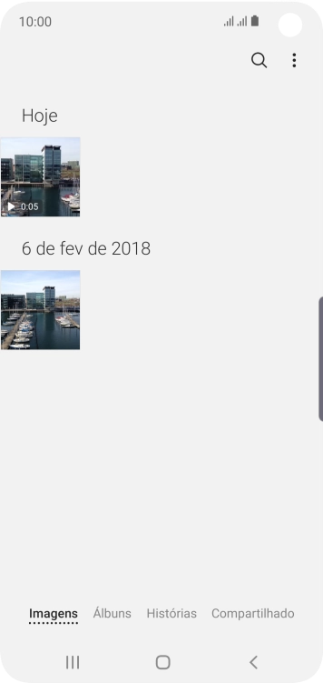 Pressione Álbuns, e navegue até a pasta desejada. Pressione Álbuns, e navegue até a pasta desejada.