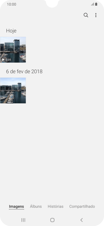 Pressione Álbuns, e navegue até a pasta desejada. Pressione Álbuns, e navegue até a pasta desejada.