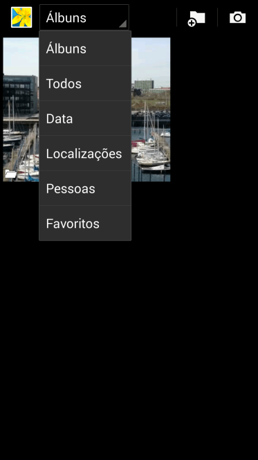 Pressione Álbuns, e navegue até a pasta desejada. Pressione Álbuns, e navegue até a pasta desejada.
