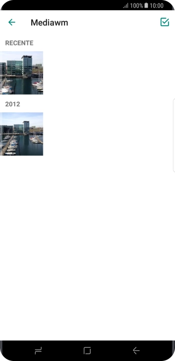 Pressione a foto ou o vídeo desejado. Pressione a foto ou o vídeo desejado.