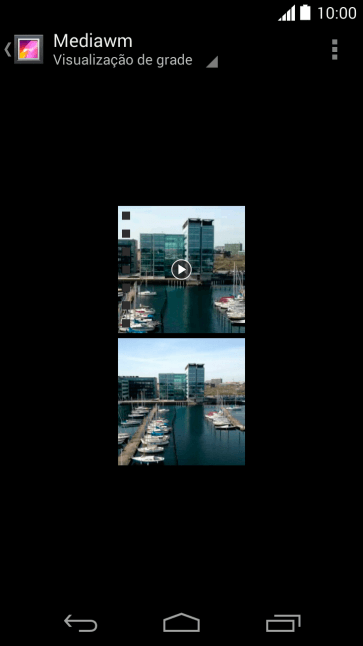 Pressione a foto ou o vídeo desejado. Pressione a foto ou o vídeo desejado.