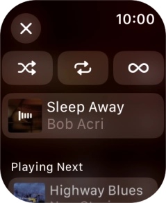 Press the shuffle icon. Press the shuffle icon.