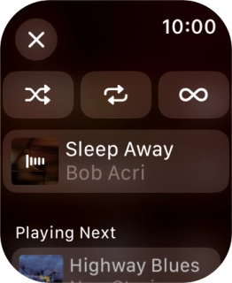 Press the shuffle icon. Press the shuffle icon.