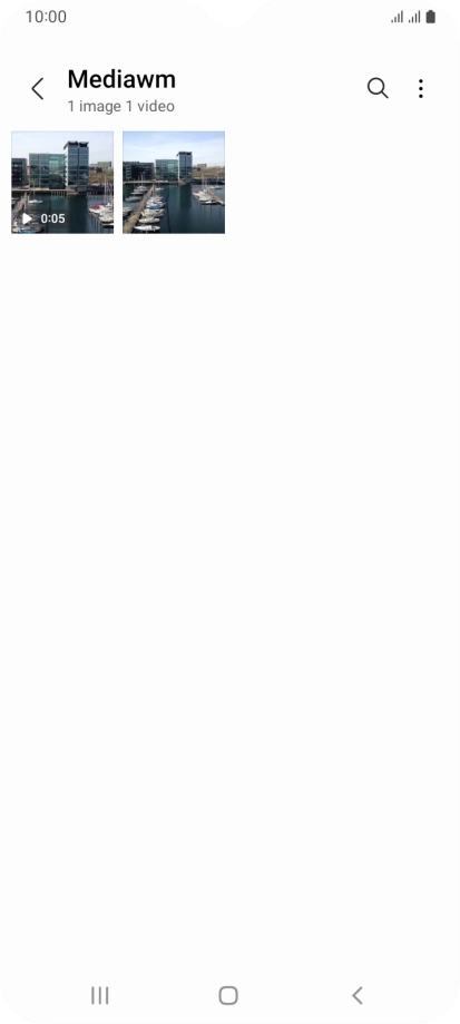 Press and hold any picture or video clip. Press and hold any picture or video clip.