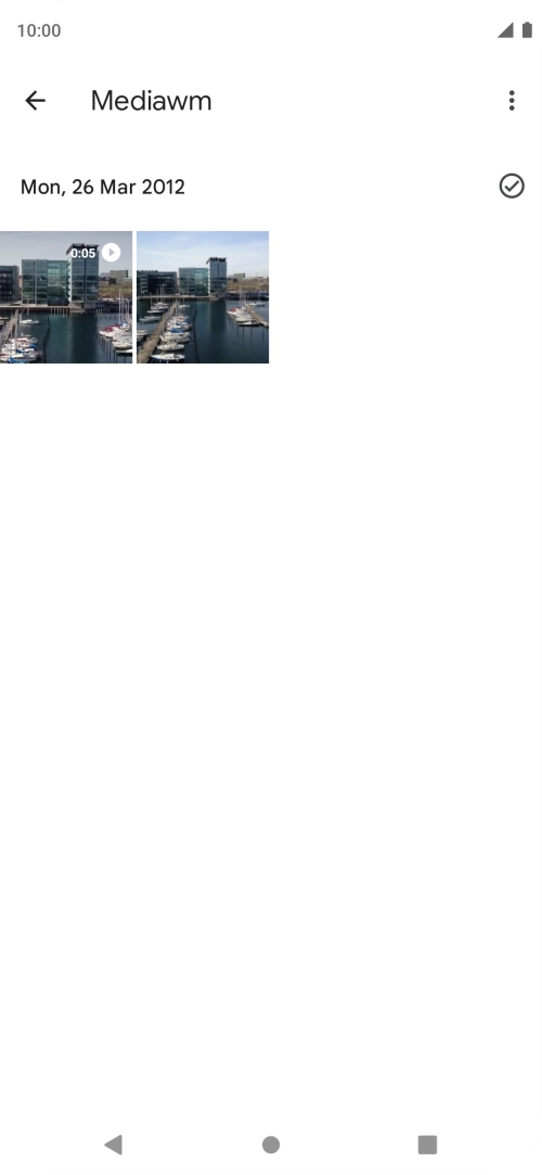 Press and hold any picture or video clip. Press and hold any picture or video clip.