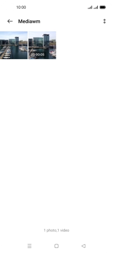 Press and hold any picture or video clip. Press and hold any picture or video clip.