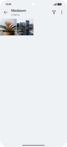 Press and hold any picture or video. Press and hold any picture or video.